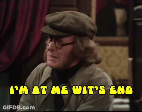 A Man Wearing A Hat And Glasses Says I 'M At Me Wit 'S End GIF