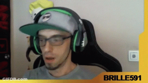 A Man Wearing A Hat And Headphones With The Name Brille591 On The Bottom Right GIF