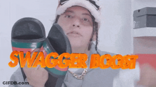 A Man Wearing A Hat And Holding A Pair Of Sandals With Swagger Boost Written On It GIF