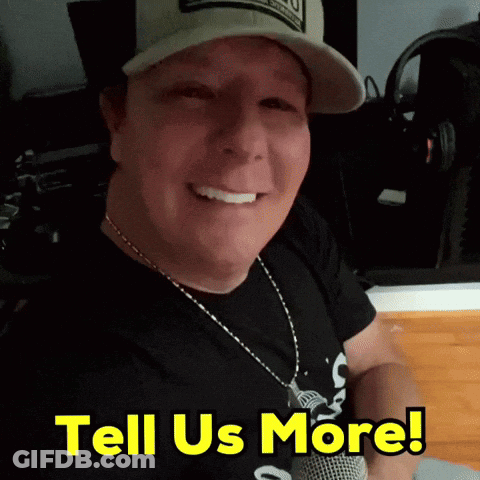 A Man Wearing A Hat And Necklace Says Tell Us More In Yellow Letters GIF