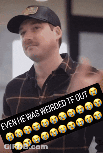 A Man Wearing A Hat And Plaid Shirt Has A Sticker That Says Even He Was Weird GIF