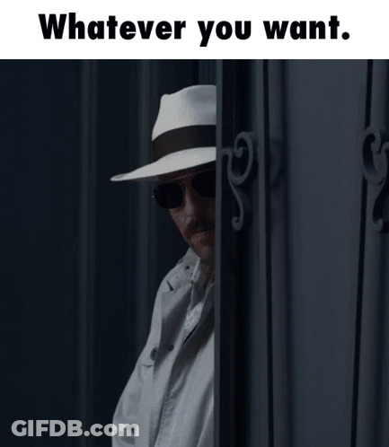 A Man Wearing A Hat And Sunglasses Is Peeking Out From Behind A Door With The Words " Whatever You Want " Above Him GIF