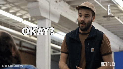 Man In Hat And Vest Saying Okay Netflix Ad GIF