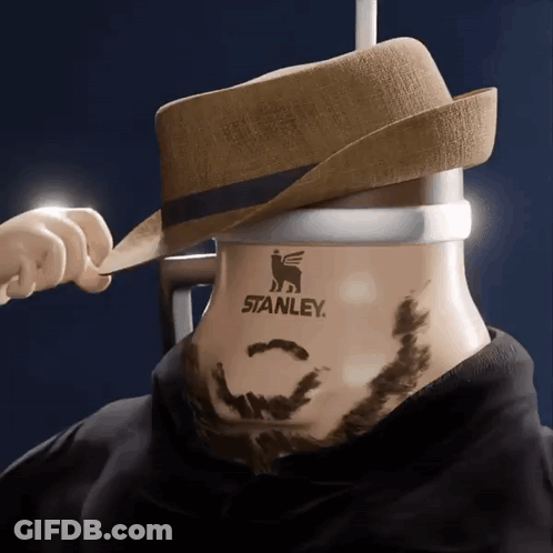 A Man Wearing A Hat Has A Stanley Logo On His Neck GIF