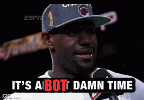 A Man Wearing A Hat Is Talking Into A Microphone And The Words It 'S A Bot Damn Time Are Above Him GIF