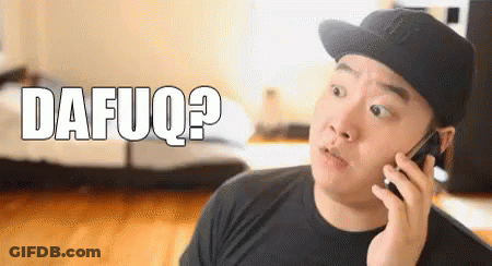 A Man Wearing A Hat Is Talking On A Cell Phone And The Word Dafuq Is Visible In The Background . GIF