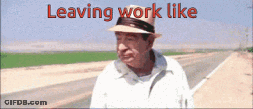 A Man Wearing A Hat Is Walking Down A Road With The Words Leaving Work Like Written Above Him GIF