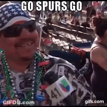 A Man Wearing A Hat , Sunglasses , Beads And A Microphone With The Words `` Go Spurs Go '' On It GIF