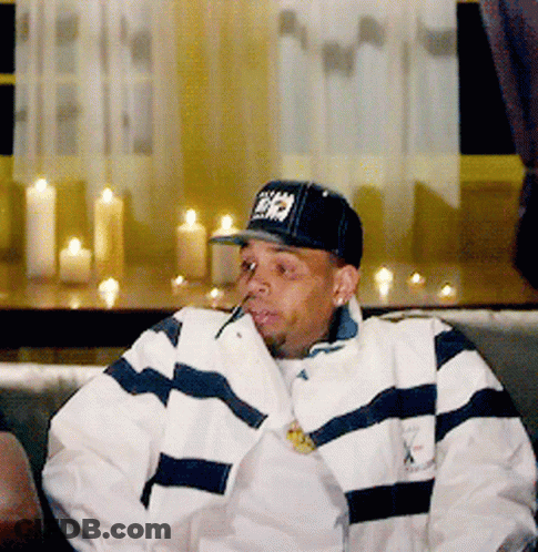 A Man Wearing A Hat That Says ' A ' On It GIF