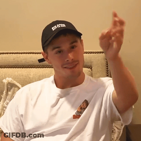 A Man Wearing A Hat That Says Big Dog Gotta Go On It GIF