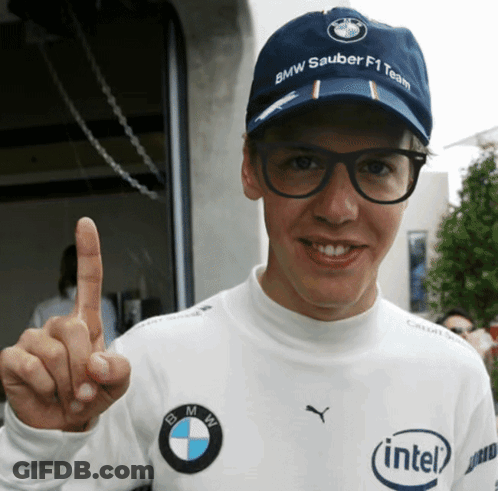 A Man Wearing A Hat That Says Bmw Sauber F1 Team On It GIF