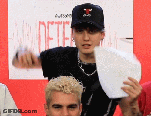 A Man Wearing A Hat That Says Bulls On It GIF