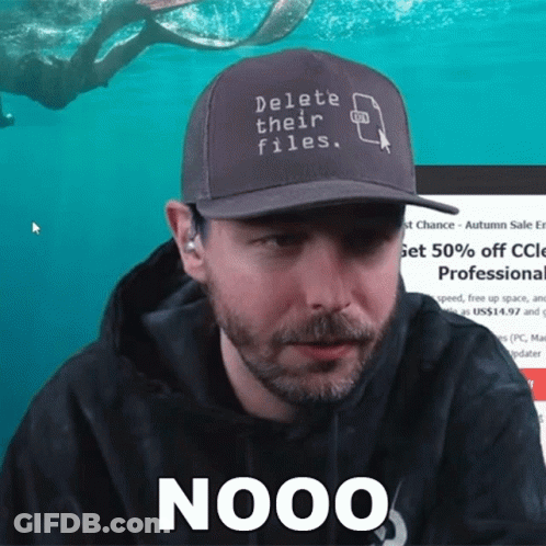 A Man Wearing A Hat That Says " Delete Their Files " GIF
