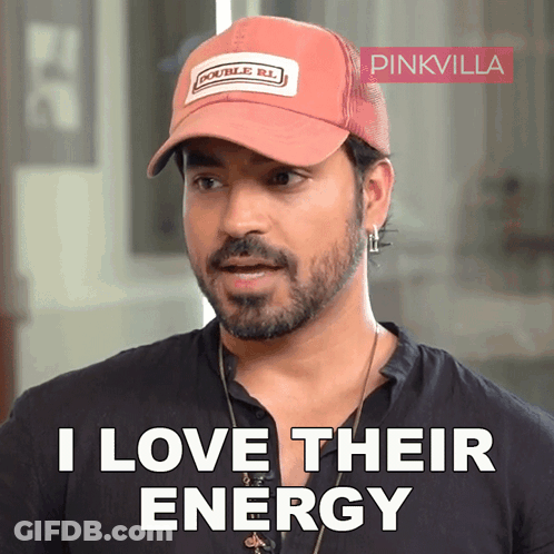 A Man Wearing A Hat That Says Double R.l. On It GIF