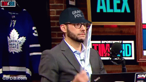 A Man Wearing A Hat That Says Grand Pol GIF