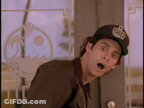 A Man Wearing A Hat That Says Hds Is Standing In Front Of A Door GIF