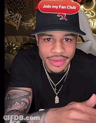 A Man Wearing A Hat That Says Join My Fan Club On The Top GIF
