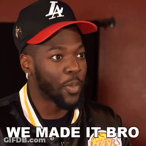 A Man Wearing A Hat That Says La On It GIF