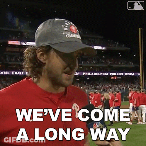 A Man Wearing A Hat That Says Philadelphia Phillies 2014 On It GIF