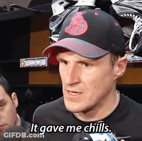 A Man Wearing A Hat That Says Reebok On It GIF
