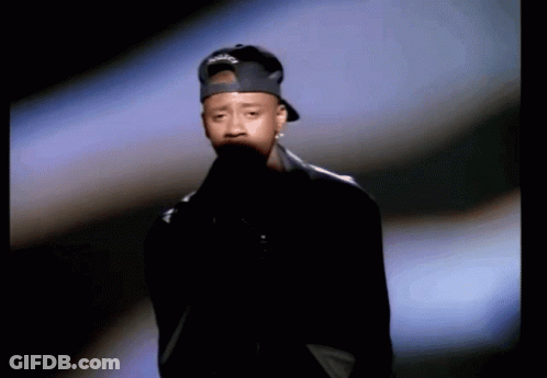 A Man Wearing A Hat That Says ' Reebok ' On It GIF