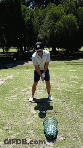 A Man Wearing A Hat That Says ' Scottsdale ' On It Is Holding A Golf Club GIF