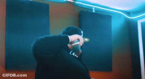 A Man Wearing A Hat That Says Us On It GIF