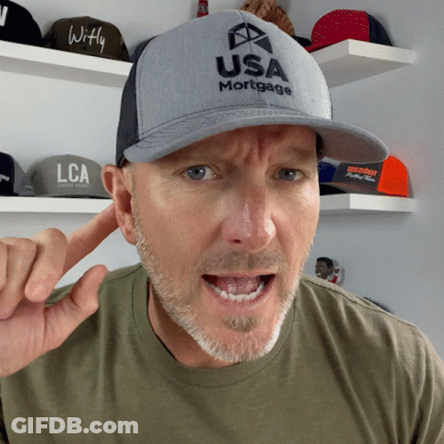 A Man Wearing A Hat That Says Usa Mortgage Is Making A Funny Face GIF