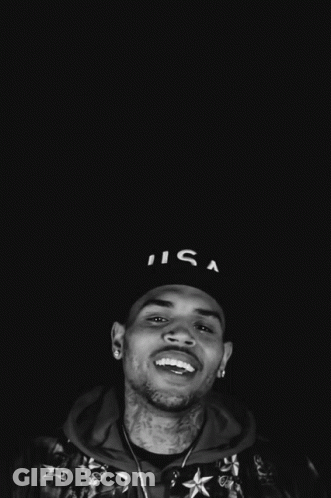 A Man Wearing A Hat That Says USA On It GIF