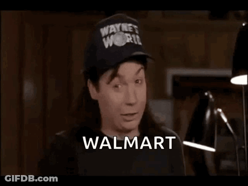 A Man Wearing A Hat That Says Wayne 'S World Is Saying Walmart It Certainly Does Suck GIF