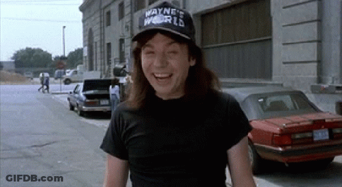A Man Wearing A Hat That Says Wayne 'S World On It GIF