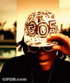 A Man Wearing A Hat With 305 On It GIF