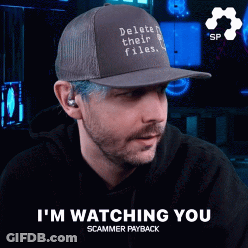 A Man Wearing A Hat With Delete Their Files On It GIF