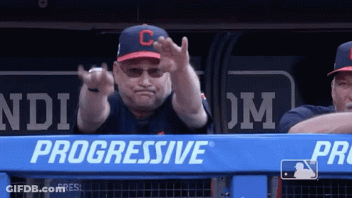 A Man Wearing A Hat With The Letter C On It Is Giving The Middle Finger GIF