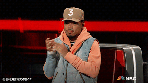 A Man Wearing A Hat With The Number 3 On It Applauds GIF