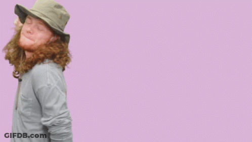A Man Wearing A Hat With The Words Aww Shucks Written On It GIF