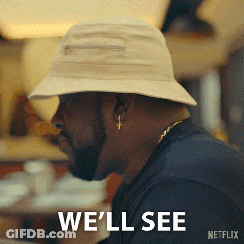 A Man Wearing A Hat With The Words We 'Ll See On It GIF