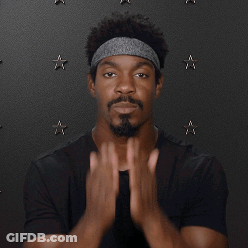 Man Wearing Headband And Black Shirt Says I Love You GIF
