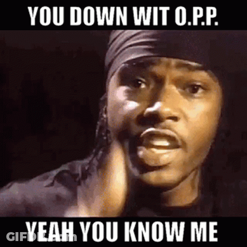 A Man Wearing A Headband Is Making A Funny Face And Saying `` You Down Wit O.p.p. '' GIF