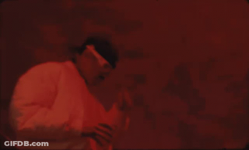 A Man Wearing A Headband That Says ' A ' On It GIF