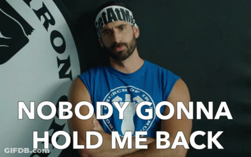 A Man Wearing A Headband That Says Iron On It GIF