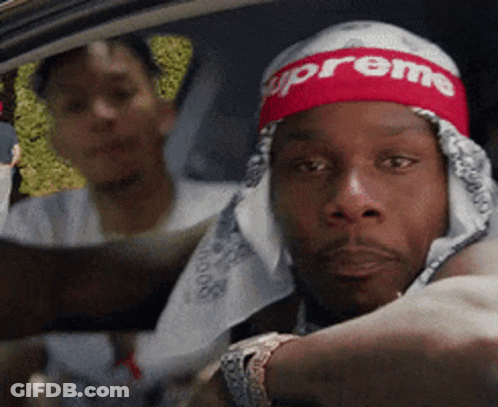 A Man Wearing A Headband That Says Supreme GIF