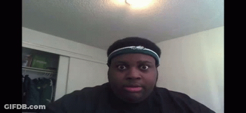 A Man Wearing A Headband With Eagles On It GIF