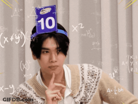 A Man Wearing A Headband With The Number 10 On Top GIF