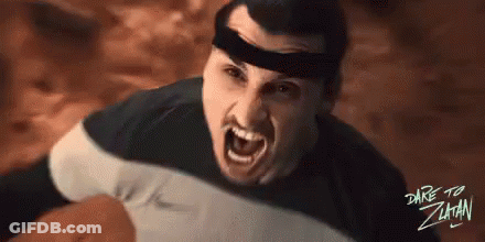 A Man Wearing A Headband With The Words Dare To Zihan Written On The Bottom GIF