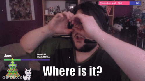 A Man Wearing A Headset Is Making A Heart With His Hands And The Words Where Is It GIF