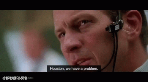 A Man Wearing A Headset Is Talking On A Phone . GIF
