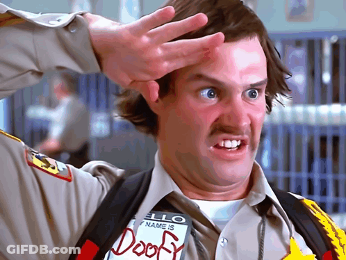 A Man Wearing A Hello My Name Is Doofy Tag GIF