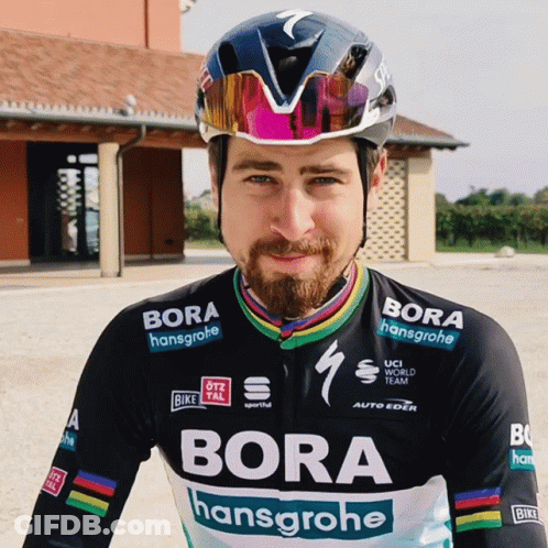 A Man Wearing A Helmet And A Jersey That Says Bora On It GIF