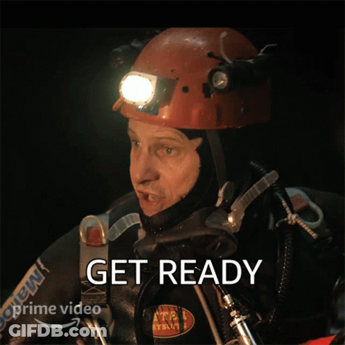 A Man Wearing A Helmet And A Mask Says Get Ready On The Bottom GIF